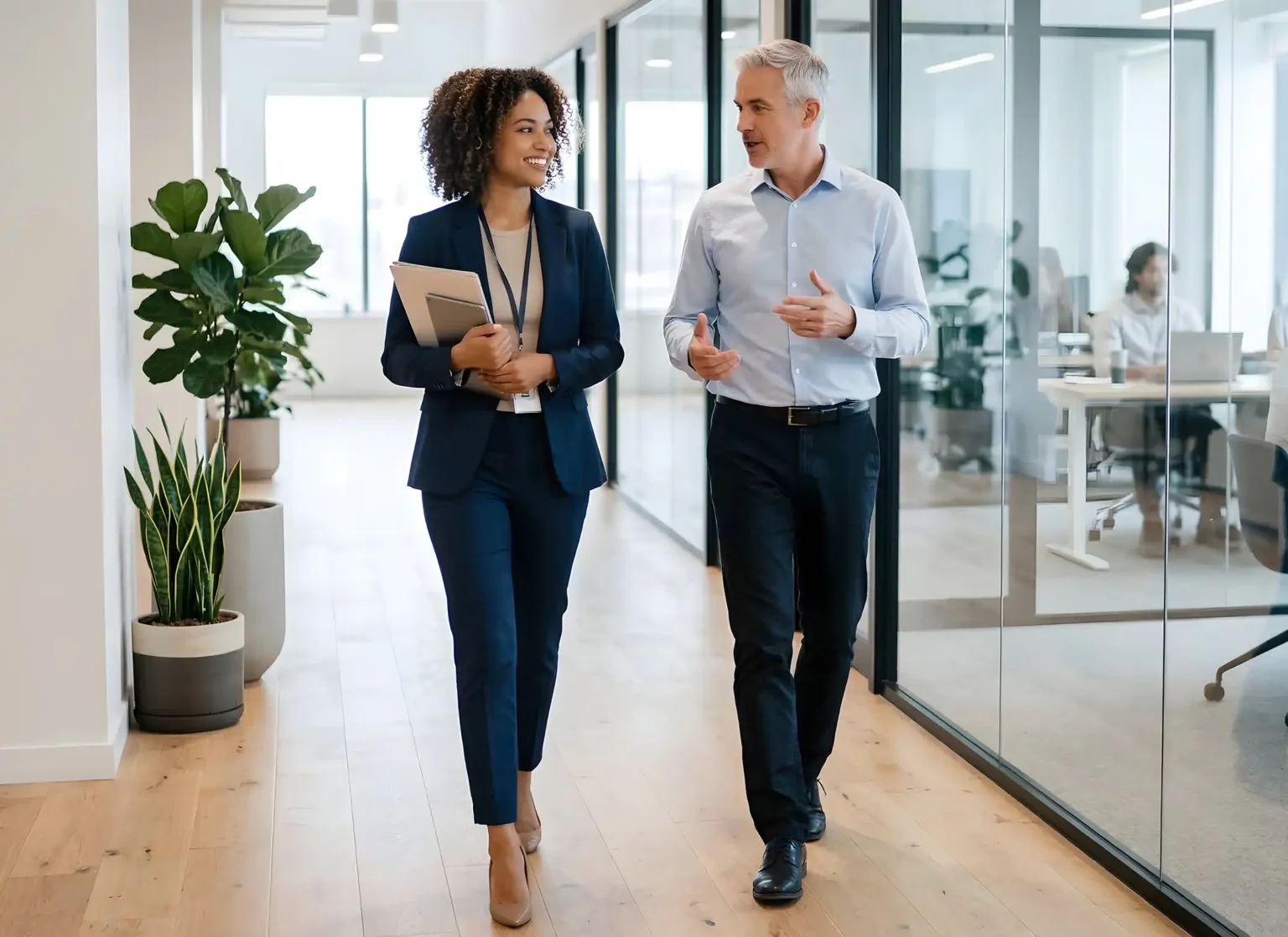 diverse business colleagues walking and talking