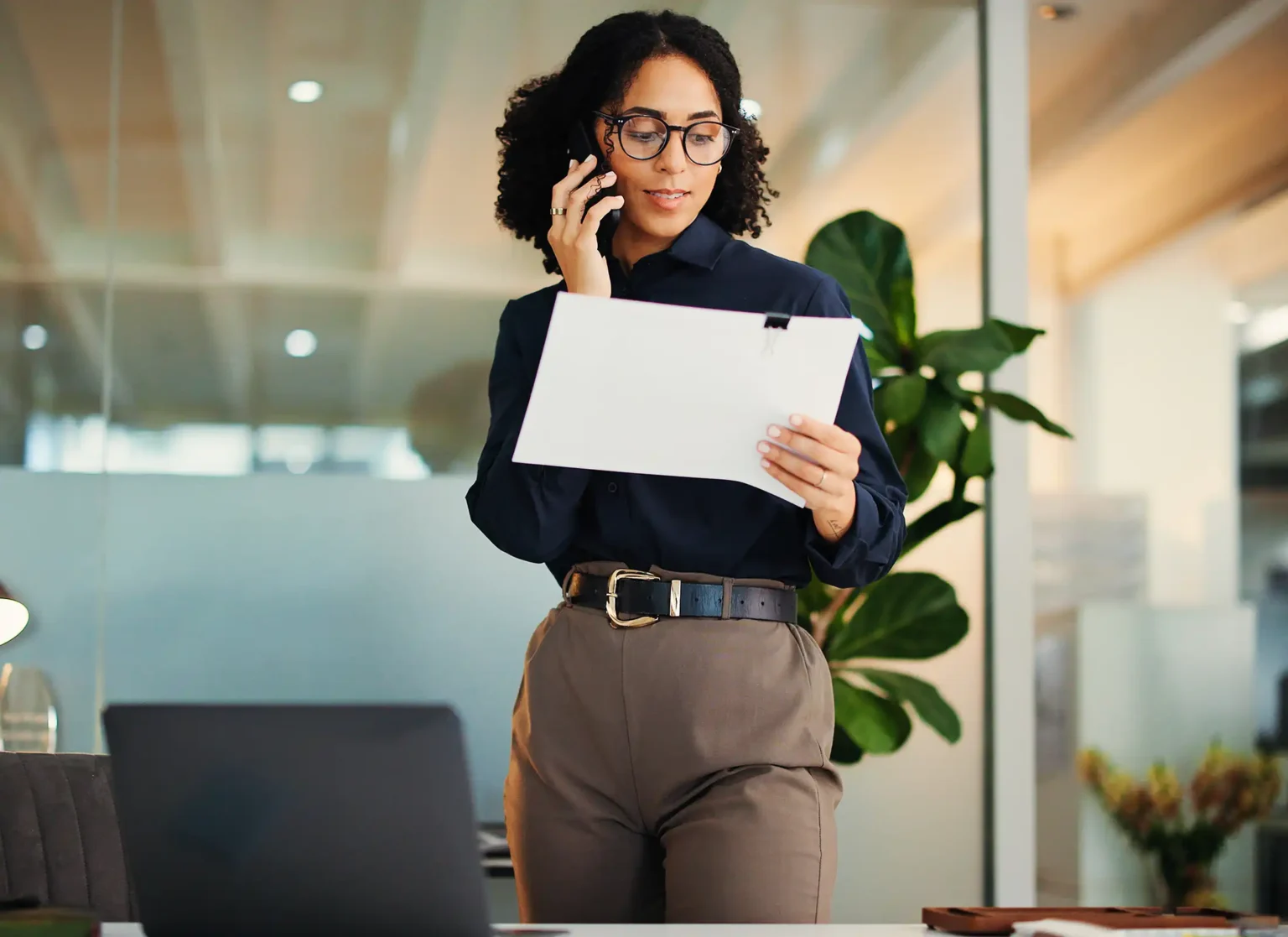 accountant and documents with phone call for proposal or finance report in office